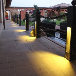 A wrought iron railing with built-in lights
